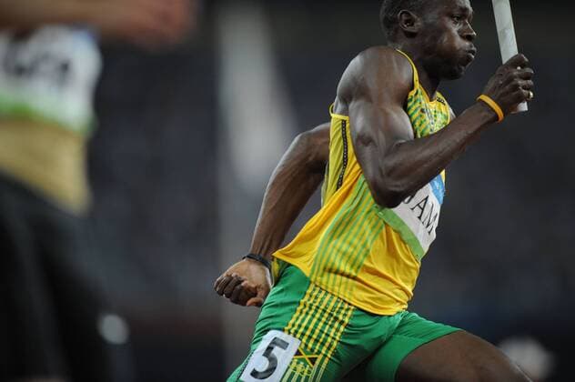 Usain Bolt (Jamaika) -  Leichtathletik OS Sommer Herren Olympische Spiele Peking 2008, Sommerspiele, 4x100m Staffel, Nationaltrikot, Einzelbild Peking Dynamik,