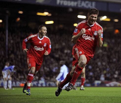 Xabi Alonso (Liverpool) - Torjubel - EDITORIAL USE ONLY. No use with unauthorised audio, video, data, fixture lists, club league logos or live services. Online in-match use limited to 120 images, no video emulation. No use in betting, games or single club league player publications. Fußball Herren English Premier League 2008 2009, 1. Englische Liga, FC Liverpool Gruppe Blackburn Freude,