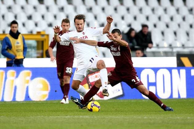 Alberto Gilardino (AC Florenz, Mitte) gegen Marco Pisano (FC Turin) -  Fußball Herren Serie A 2008 2009, 1. Italienische Liga, Torino FC - ACF Fiorentina 1:4, AC Florenz Gruppe Turin Dynamik,