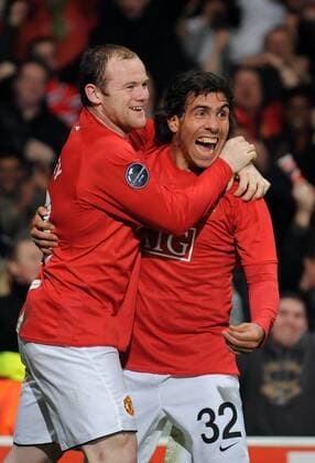 Wayne Rooney (li.) und Carlos Tevez (beide Manchester United) - Torjubel - EDITORIAL USE ONLY. No use with unauthorised audio, video, data, fixture lists, club league logos or live services. Online in-match use limited to 120 images, no video emulation. No use in betting, games or single club league player publications. Fußball EC 1 Herren Champions League 2008 2009, Manchester United, ManU Gruppe Manchester Freude,