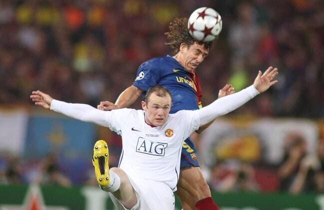 Carles Puyol (FC Barcelona, o.) gegen Wayne Rooney (Manchester United) -  Fußball EC 1 Herren Champions League Finale 2008 2009, FC Barcelona - Manchester United, ManU, Barca Gruppe Rom Dynamik,