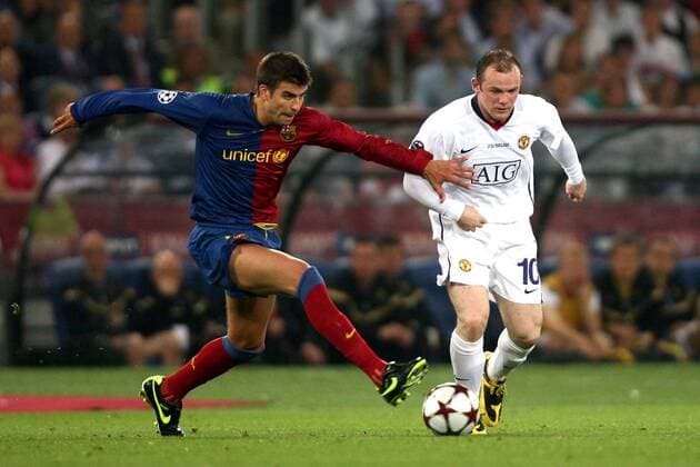 Wayne Rooney (Manchester United, re.) gegen Gerard Pique (FC Barcelona) -  Fußball EC 1 Herren Champions League Finale 2008 2009, Manu - Barca Gruppe Rom Dynamik, Kampf,