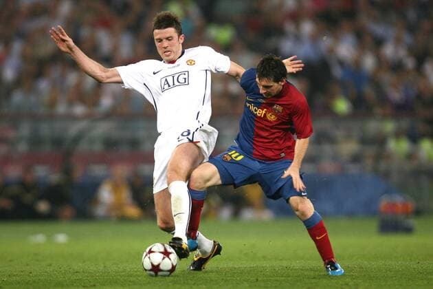 Lionel Messi (FC Barcelona, re.) gegen Michael Carrick (Manchester United) -  Fußball EC 1 Herren Champions League Finale 2008 2009, Manu - Barca 0:2 Gruppe Rom Dynamik, Kampf,