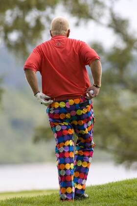 John Daly (USA) in einer farbenfrohen Hose - EDITORIAL USE ONLY. No use with unauthorised audio, video, data, fixture lists, club league logos or live services. Online in-match use limited to 120 images, no video emulation. No use in betting, games or single club league player publications. Golf Herren The Barclays Scottish Open 2009, PGA European Tour Einzelbild Loch Lomond