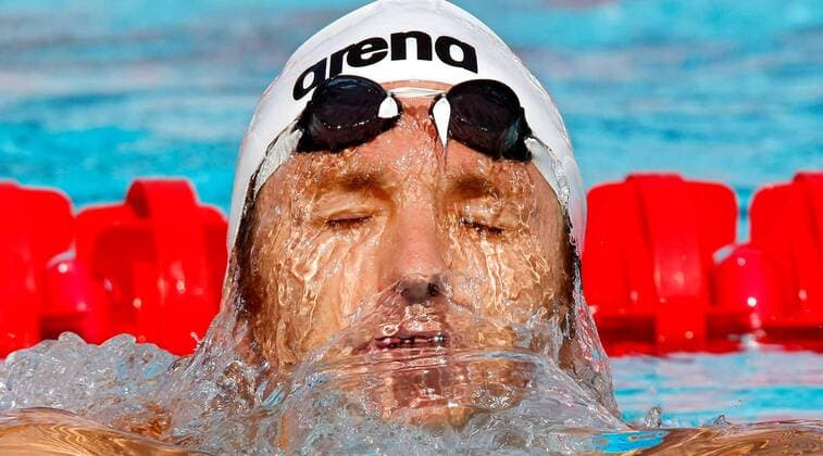 ROM, Weltmeisterschaft - 200m Rücken, Herren. Aaron Peirsol (USA).  o0 Aufmacher, Wasserblase, Sponsor, Werbepartner, Werbung, Wirtschaft, Arena, kurios