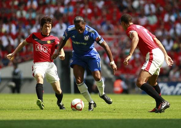 Chelsea s Didier Drogba (C) in action - Community Shield: Chelsea v Manchester United EDITORIAL USE ONLY. No use with unauthorised audio, video, data, fixture lists, club league logos or live services. Online in-match use limited to 120 images, no video emulation. No use in betting, games or single club league player publications. o0 FC - ManU