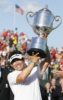 Y. E. Yang of South Korea hoists the Rodman Wanamaker Trophy over his head after winning the 91st PGA Championship  BKX20090816214
