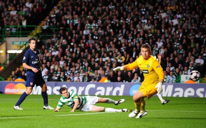 Artur Boruc of Celtic Glasgow (R) watches as the ball is deflected past him for the second goal - EDITORIAL USE ONLY. No use with unauthorised audio, video, data, fixture lists, club league logos or live services. Online in-match use limited to 120 images, no video emulation. No use in betting, games or single club league player publications.