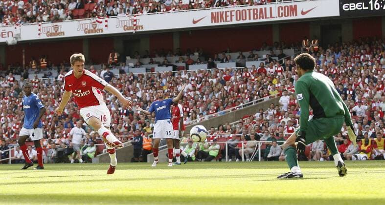 FC Arsenal London s Aaron Ramsey (L) scoring his sides fourth goal EDITORIAL USE ONLY. No use with unauthorised audio, video, data, fixture lists, club league logos or live services. Online in-match use limited to 120 images, no video emulation. No use in betting, games or single club league player publications.