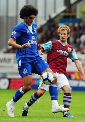 Wade Elliott of Burnley FC (R) challenges Marouane Fellaini of Everton FC Burnley FC v Everton FC EDITORIAL USE ONLY. No use with unauthorised audio, video, data, fixture lists, club league logos or live services. Online in-match use limited to 120 images, no video emulation. No use in betting, games or single club league player publications.