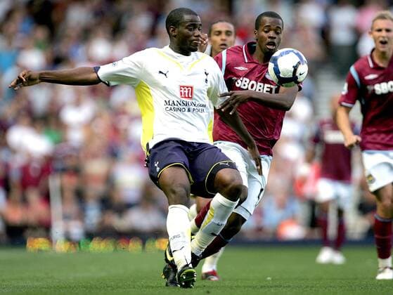 Sebastien Bassong of Tottenham Hotspur (L) and Zavon Hines of West Ham United West Ham United v Tottenham Hotspur Hotspurs Spurs EDITORIAL USE ONLY. No use with unauthorised audio, video, data, fixture lists, club league logos or live services. Online in-match use limited to 120 images, no video emulation. No use in betting, games or single club league player publications.