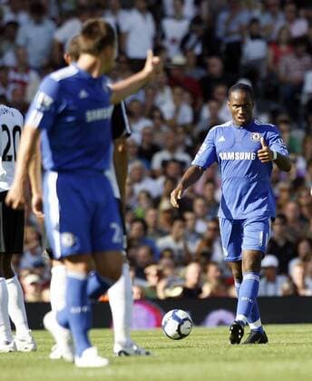 Chelsea FC London s Didier Drogba (R) celebrates EDITORIAL USE ONLY. No use with unauthorised audio, video, data, fixture lists, club league logos or live services. Online in-match use limited to 120 images, no video emulation. No use in betting, games or single club league player publications.