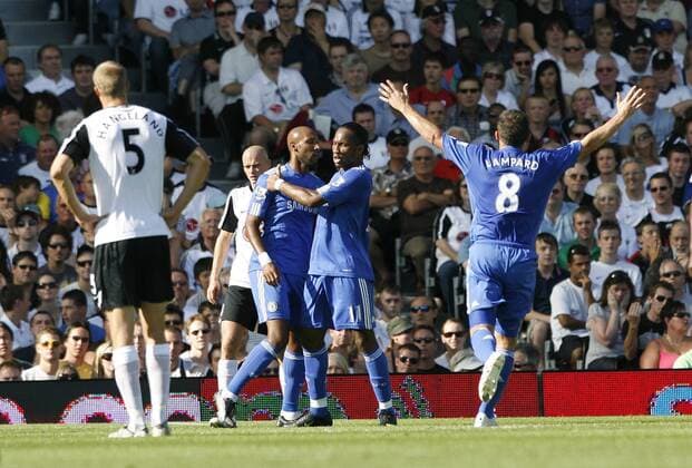 Chelsea FC London s Didier Drogba (C) celebrates scoring vs FC Fulham EDITORIAL USE ONLY. No use with unauthorised audio, video, data, fixture lists, club league logos or live services. Online in-match use limited to 120 images, no video emulation. No use in betting, games or single club league player publications.