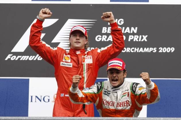Kimi Räikkönen (Finnland Ferrari, li.) gewinnt den Großen Preis von Belgien 2009 vor Giancarlo Fisichella (Italien Force India) Motorsport Grand Prix Herren Großer Preis von Belgien 2009, Formel 1 Weltmeisterschaft, F1, F, GP, WM Gruppe Spa-Francorchamps Begeisterung, Freude,