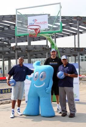 (From left) NBA player Caron Butler of the Washington Wizards, former Bullets player Gheorghe Muresan and NBA Hall of Fame center Wes Unseld pose with the Shanghai Expo 2010 mascot at the construction site of the USA Pavilion in Shanghai, China,  20090907_75327