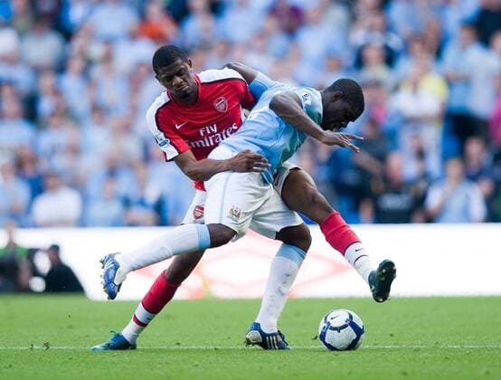 Vassiriki Diaby of Arsenal London (l.) challenges Micah Richards of Manchester City Barclays Premier League Manchester City v Arsenal 12th September, 2009 EDITORIAL USE ONLY. No use with unauthorised audio, video, data, fixture lists, club league logos or live services. Online in-match use limited to 120 images, no video emulation. No use in betting, games or single club league player publications.