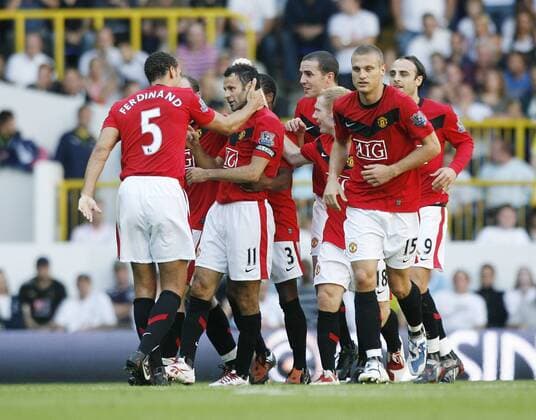 Manchester United s Ryan Giggs celebrates his opening goal Barclays Premier League Tottenham Hotspur v Manchester United 12th September, 2009 EDITORIAL USE ONLY. No use with unauthorised audio, video, data, fixture lists, club league logos or live services. Online in-match use limited to 120 images, no video emulation. No use in betting, games or single club league player publications.