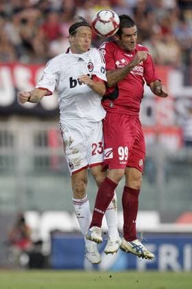 Livorno 12 09 2009 - Serie A AC Livorno (red) - AC Milan Massimo Ambrosini (L) - Cristiano Lucarelli 