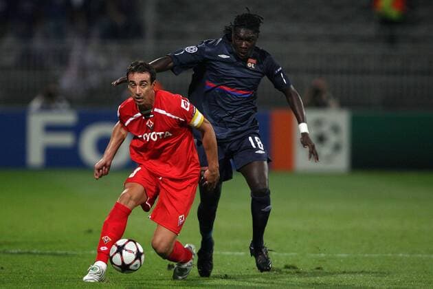 Olympique Lyonnais (OL) - ACF Fiorentina - Bafetimbi Gomis (Lyon, R) et Dario Dainelli (AC Florenz) - 