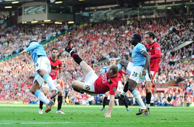 Wayne Rooney of Manchester United attempts an over head kick - EDITORIAL USE ONLY. No use with unauthorised audio, video, data, fixture lists, club league logos or live services. Online in-match use limited to 120 images, no video emulation. No use in betting, games or single club league player publications. o0 City