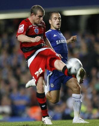 Chelsea London s Joe Cole (R) tussles with QPR s Gary Borrowdale - Carling Cup Chelsea v QPR (Queens Park Rangers) - 23rd September, 2009 EDITORIAL USE ONLY. No use with unauthorised audio, video, data, fixture lists, club league logos or live services. Online in-match use limited to 120 images, no video emulation. No use in betting, games or single club league player publications. o00 FC