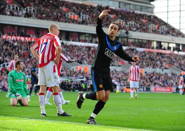 Dimitar Berbatov of Manchester United celebrates scoring the first goal -- Barclays Premier League Stoke City v Manchester United 26th September, 2009 EDITORIAL USE ONLY. No use with unauthorised audio, video, data, fixture lists, club league logos or live services. Online in-match use limited to 120 images, no video emulation. No use in betting, games or single club league player publications. o0 Jubel Freude