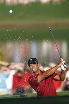 Tiger Woods (USA) digs out of the bunker on the 18th in the final round of the FedEx Cup in Atlanta - Icon4880909270636 EDITORIAL USE ONLY