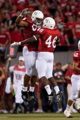 26 September 2009: Nebraska defensive tackle Ndamukong Suhand and linebacker Eric Martin celebrate the pass interception for a touchdown by safety Larry Asante in the second quarter against Louisiana-Lafayette at Memorial Stadium, Lincoln, Nebraska. Nebraska defeats Louisiana Lafayette 55 to 0. Icon09092639 EDITORIAL USE ONLY