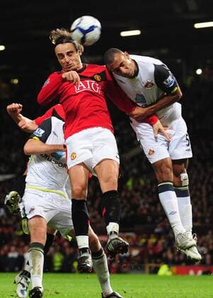 Dimitar Berbatov (l.) of Manchester United and Anton Ferdinand of Sunderland - Manchester United - FC Sunderland AFC EDITORIAL USE ONLY. No use with unauthorised audio, video, data, fixture lists, club league logos or live services. Online in-match use limited to 120 images, no video emulation. No use in betting, games or single club league player publications. o0 ManU