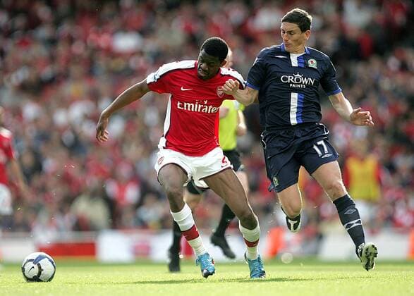 Abou Diaby (l.) of Arsenal FC London holds off Keith Andrews of Blackburn Rovers EDITORIAL USE ONLY. No use with unauthorised audio, video, data, fixture lists, club league logos or live services. Online in-match use limited to 120 images, no video emulation. No use in betting, games or single club league player publications.