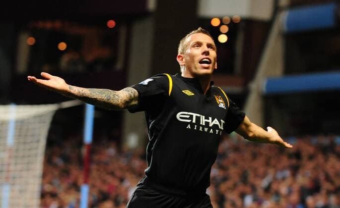 Craig Bellamy of Manchester City celebrates - EDITORIAL USE ONLY. No use with unauthorised audio, video, data, fixture lists, club league logos or live services. Online in-match use limited to 120 images, no video emulation. No use in betting, games or single club league player publications. o0 Birmingham