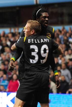 Craig Bellamy of Manchester City celebrates with Emmanuel Adebayor - EDITORIAL USE ONLY. No use with unauthorised audio, video, data, fixture lists, club league logos or live services. Online in-match use limited to 120 images, no video emulation. No use in betting, games or single club league player publications. o0 Birmingham