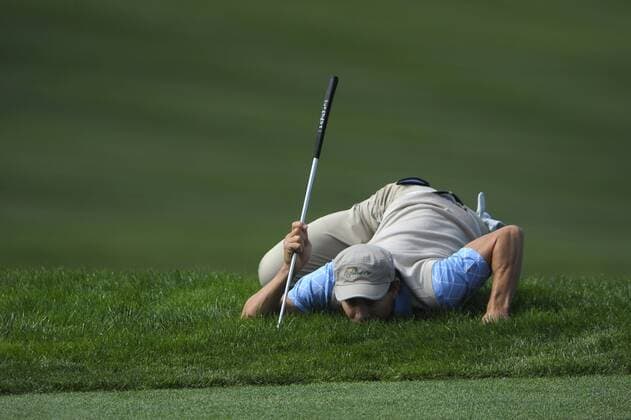 International team member Camilo Villegas lines up a shot on the 1st green during the second round of The Presidents Cup at Harding Park Golf Course in San Francisco, California on October 9, 2009.  SFP20091009303 o00 The President s
