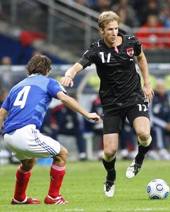 Julien Escude (FRA, li.) und Marc Janko (AUT). 