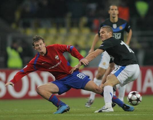 CSKA Moscow s Tomas Necid (L) and Manchester United s Nemanja Vidic  RE0C0BE0 o0 ManU