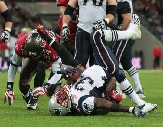 New England Patriots Laurence Maroney is brought to the ground during the match against the Tampa Bay Buccaneers at Wembley stadium in London on Sunday October 25 2009. (  LON2009102507