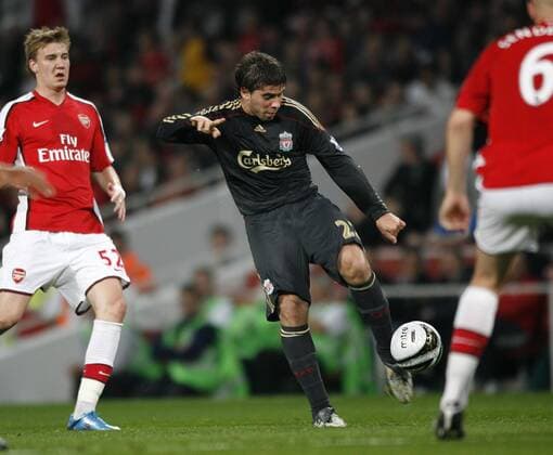 FC Liverpool s Emiliano Insua (c.) vs Arsenal London EDITORIAL USE ONLY. No use with unauthorised audio, video, data, fixture lists, club league logos or live services. Online in-match use limited to 120 images, no video emulation. No use in betting, games or single club league player publications.