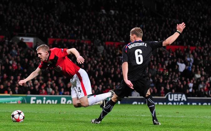 Darren Fletcher (L) of Manchester United is brought down in the penalty area by Aleksei Berezutski of CSKA Moscow - Manchester United v CSKA Moscow - EDITORIAL USE ONLY. No use with unauthorised audio, video, data, fixture lists, club league logos or live services. Online in-match use limited to 120 images, no video emulation. No use in betting, games or single club league player publications.