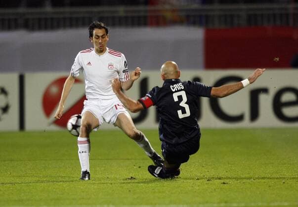 Lyon s Cris (r.) tussles with Liverpool s Yossi Benayoun - UEFA Champions League Group E Olympique Lyonnais v FC Liverpool 4th November, 2009 EDITORIAL USE ONLY. No use with unauthorised audio, video, data, fixture lists, club league logos or live services. Online in-match use limited to 120 images, no video emulation. No use in betting, games or single club league player publications. o0 Kampf