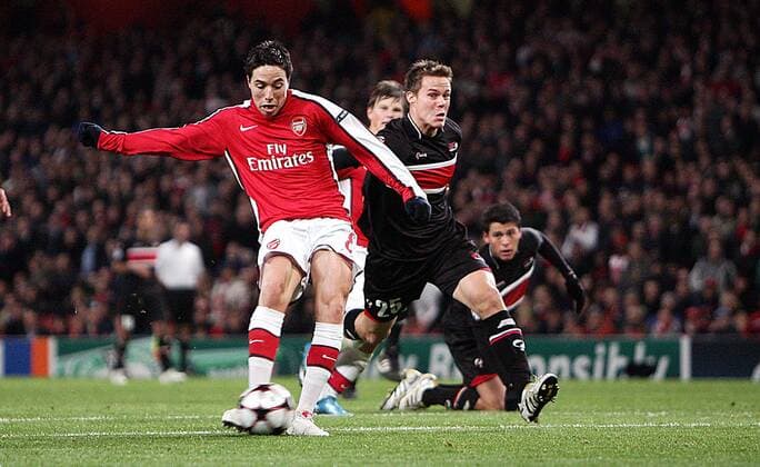 Samir Nasri of Arsenal (L) scores his side s second goal - Arsenal FC London vs AZ Alkmaar EDITORIAL USE ONLY. No use with unauthorised audio, video, data, fixture lists, club league logos or live services. Online in-match use limited to 120 images, no video emulation. No use in betting, games or single club league player publications.