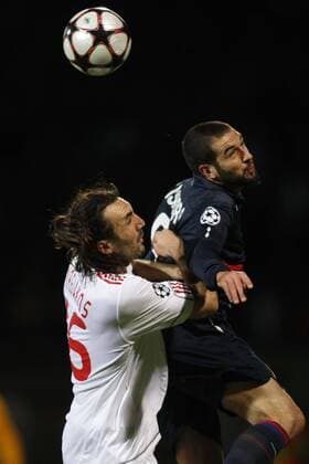 Olympique Lyon - Liverpool FC, LISANDRO LOPEZ (OL, re.) und Sotirios Kyrgiakos - NLEGOUICFEP - 