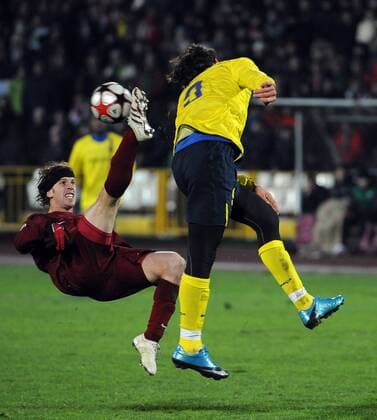 FC Barcelona s Zlatan Ibrahimovic (R) and Rubin Kazan s Cristian Daniel Ansaldi  TASS_1055269