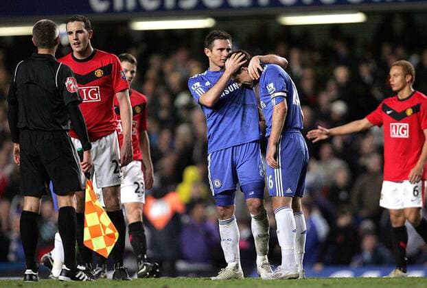 Frank Lampard (M) and John Terry (2R) of FC Chelsea London congratulate each other while John O Shea of Manchester United complains to the referee at the final whistle EDITORIAL USE ONLY. No use with unauthorised audio, video, data, fixture lists, club league logos or live services. Online in-match use limited to 120 images, no video emulation. No use in betting, games or single club league player publications.