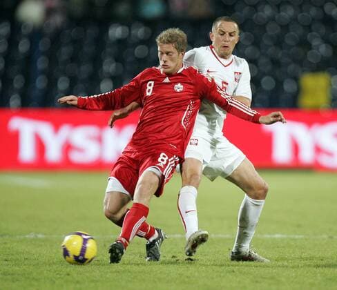 Poland - Canada: NZ MARCEL DE JONG (Canada, l.) vs DARIUSZ DUDKA Poland 