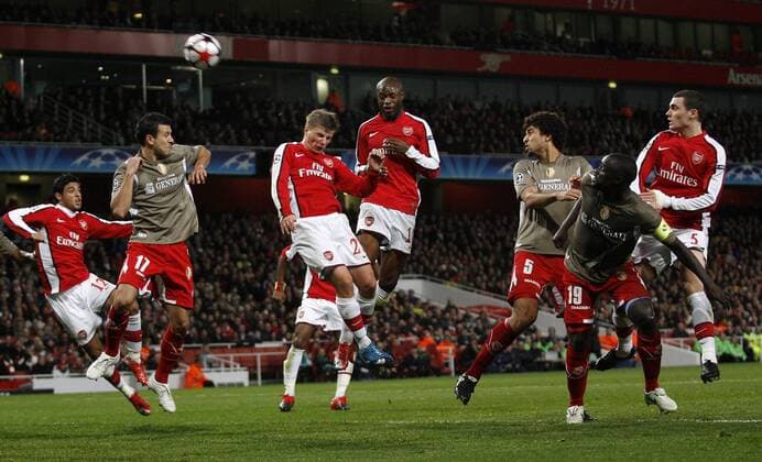 Arsenal s William Gallas (4.R.) injures himself after a class of heads with Andrei Arshavin (3.L.), UEFA Champions League Group H Arsenal v Standard Liege 24th November, 2009 EDITORIAL USE ONLY. No use with unauthorised audio, video, data, fixture lists, club league logos or live services. Online in-match use limited to 120 images, no video emulation. No use in betting, games or single club league player publications. o0 FC London