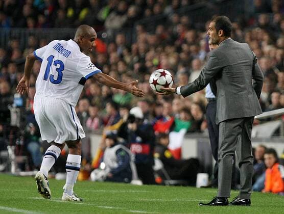 FC Barcelona s coach Pep Guardiola (l) and Inter Milan s Maicon during the Champions League match.November 24 2009.  (20091124114)