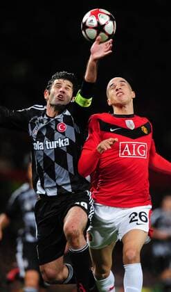 Ibrahim Uzulmez (Besiktas Istanbul, l.) and Gabriel Obertan (Manchester United, ManU) - Manchester United v Besiktas -EDITORIAL USE ONLY. No use with unauthorised audio, video, data, fixture lists, club league logos or live services. Online in-match use limited to 120 images, no video emulation. No use in betting, games or single club league player publications.