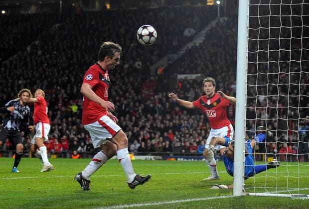 Gary Neville (L) of Manchester United fails to reach a rebound in front of goal as Michael Owen of Manchester United watches Champions League Group B Manchester United v Besiktas Istanbul 25th November, 2009 EDITORIAL USE ONLY. No use with unauthorised audio, video, data, fixture lists, club league logos or live services. Online in-match use limited to 120 images, no video emulation. No use in betting, games or single club league player publications. o0 ManU, Istanbul