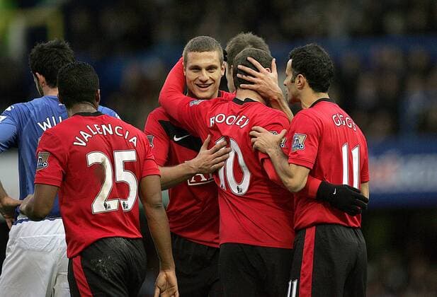 L2R: Nemanja Vidic, Wayne Rooney, Ryan Giffs of Manchester United celebrate Barclays Premier League Portsmouth FC v Manchester United 28th November, 2009 EDITORIAL USE ONLY. No use with unauthorised audio, video, data, fixture lists, club league logos or live services. Online in-match use limited to 120 images, no video emulation. No use in betting, games or single club league player publications. o0 Jubel Freude