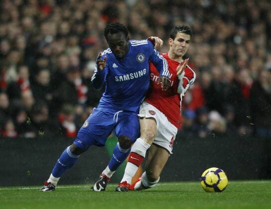 Arsenal s Cesc Fabregas (R) tussles with Chelsea s Michael Essien - Premier League Arsenal FC London vs Chelsea FC London on 29th November, 2009 - EDITORIAL USE ONLY. No use with unauthorised audio, video, data, fixture lists, club league logos or live services. Online in-match use limited to 120 images, no video emulation. No use in betting, games or single club league player publications.